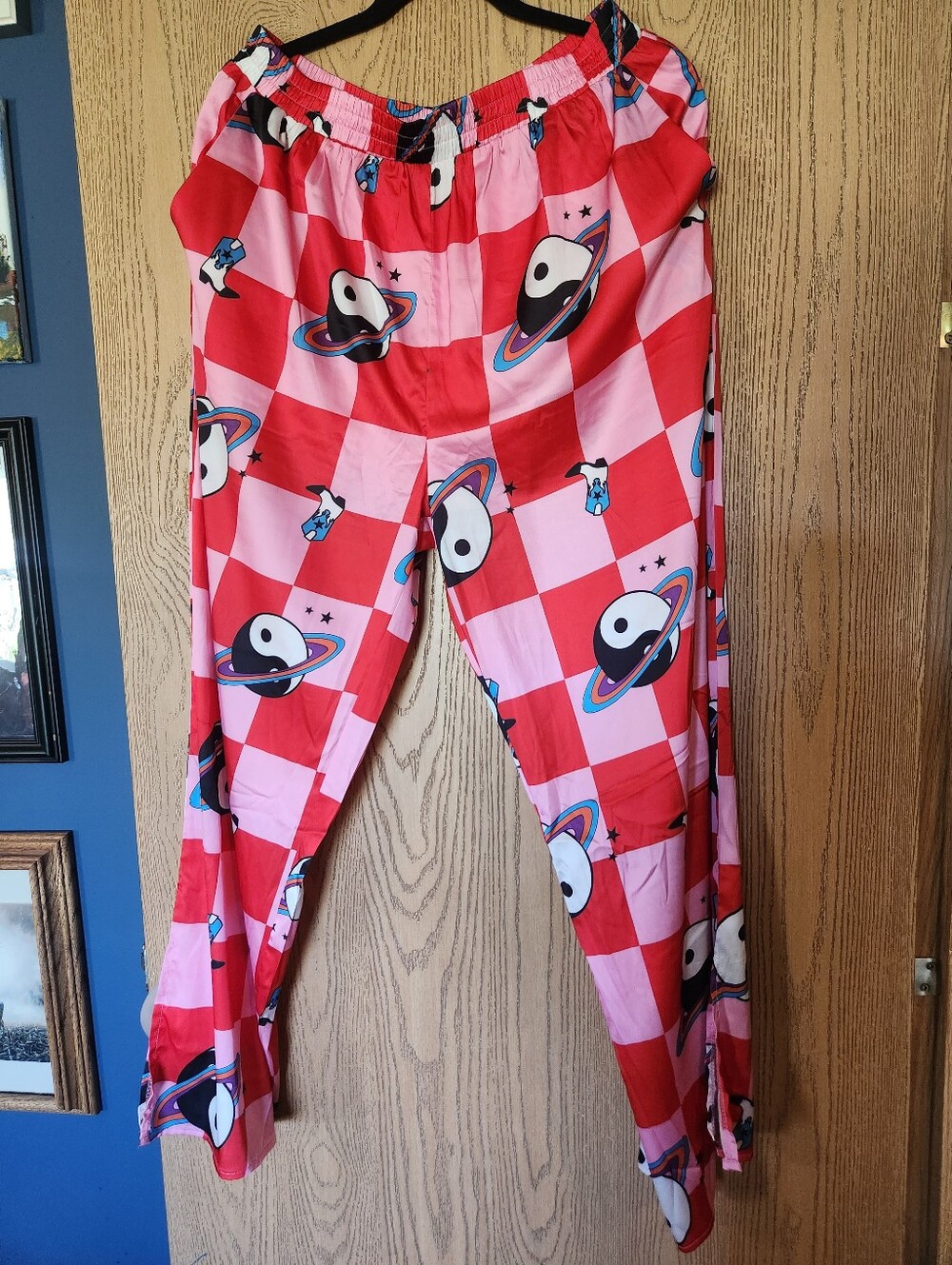Dressed in LALA Red and Pink Wide Leg Pants with Space Yin-Yang Print
